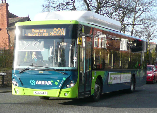 Nice to see colourful bus to cheer us up. Warrington Own Buses celebrating local heros seen in Weston Village on the 3D Sunday service in Runcorn is ADL Enviro200 Reg: YX10 BCU No: 225.