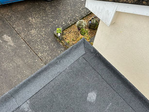 Overhead view of completed garage roof replacement