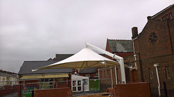Kik cantilever canopy st Charles primary school Blackburn