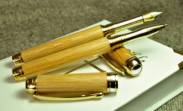 Handturned Mawredd Rollerball and fountain pen set in old church oak wood