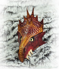 Handmade leather dragon mask with hand tooled and painted leather £32