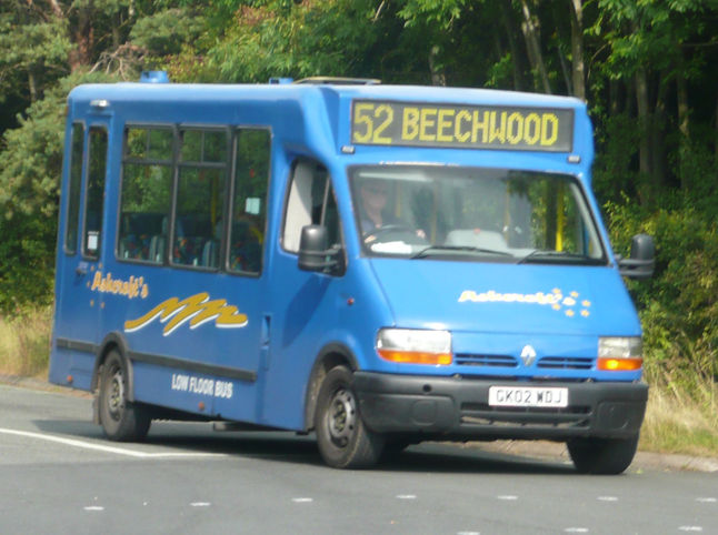 Turning off the busway at Beechwood, Runcorn is Ashcroft's Renault minibus reg: GK02 WDJ on service 52 in a striking blue livery.