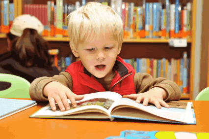 boy three blonde reading