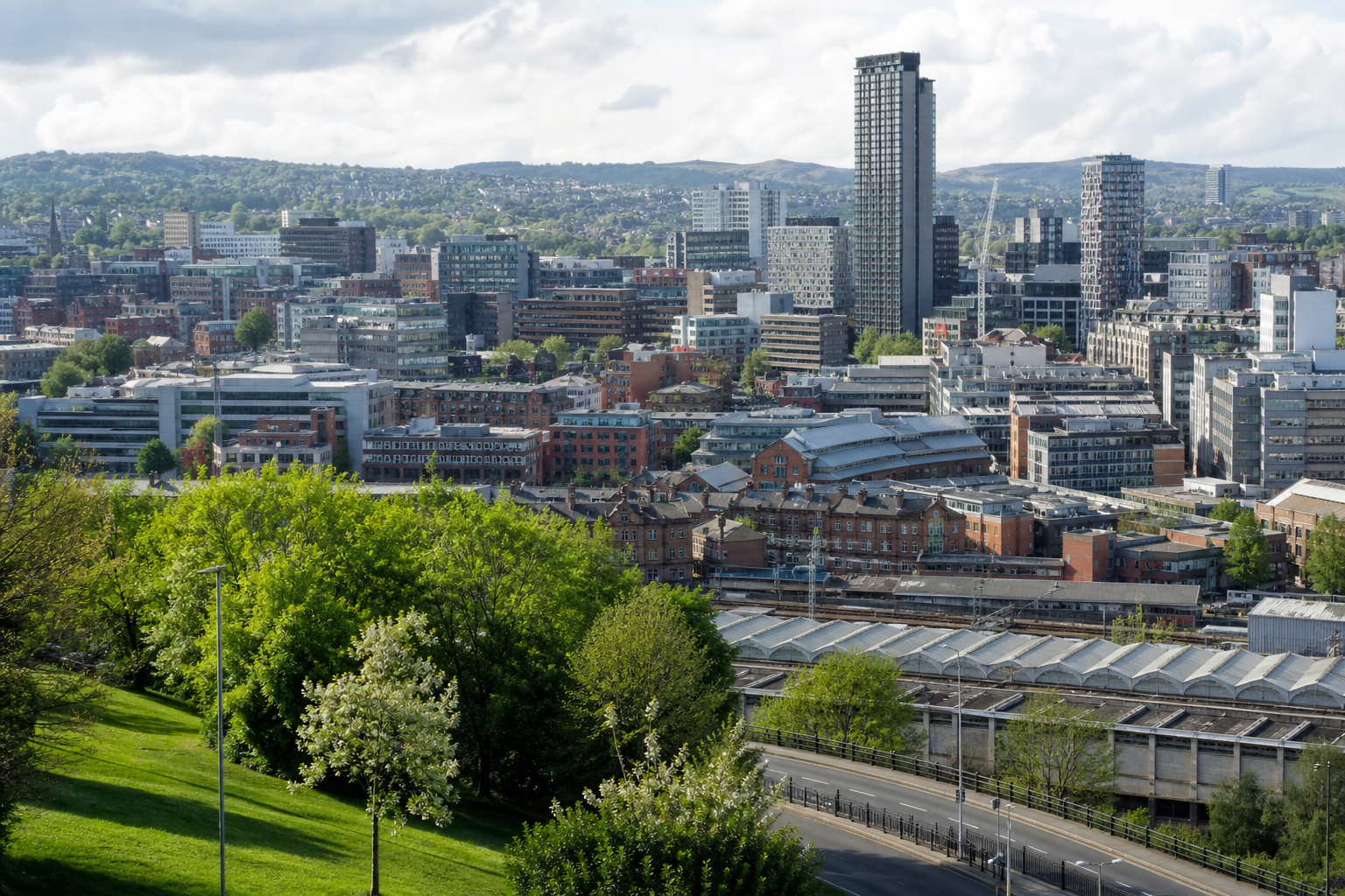 A cityscape featuring a mix of modern and traditional buildings with green trees in the foreground under a cloudy sky.