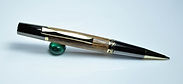 Handturned Ballpoint pen in gold and gunmetal.jpg
