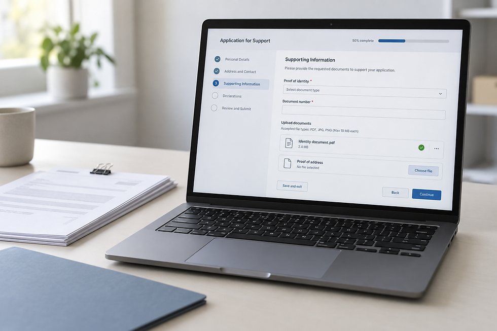 A laptop on a desk displays an application form with supporting information for submission.