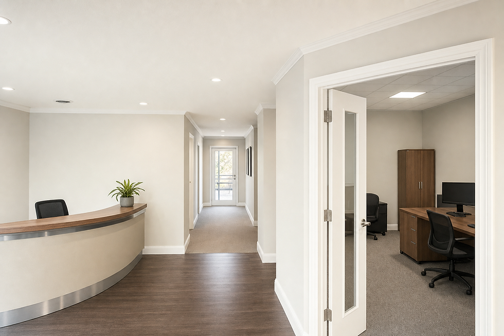Modern office interior with a reception desk, a hallway, and an open door leading to a workspace with a desk and chairs.