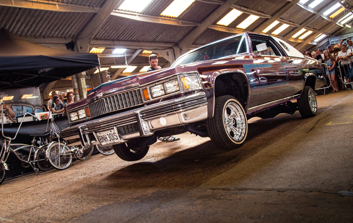 lowriders in a barn