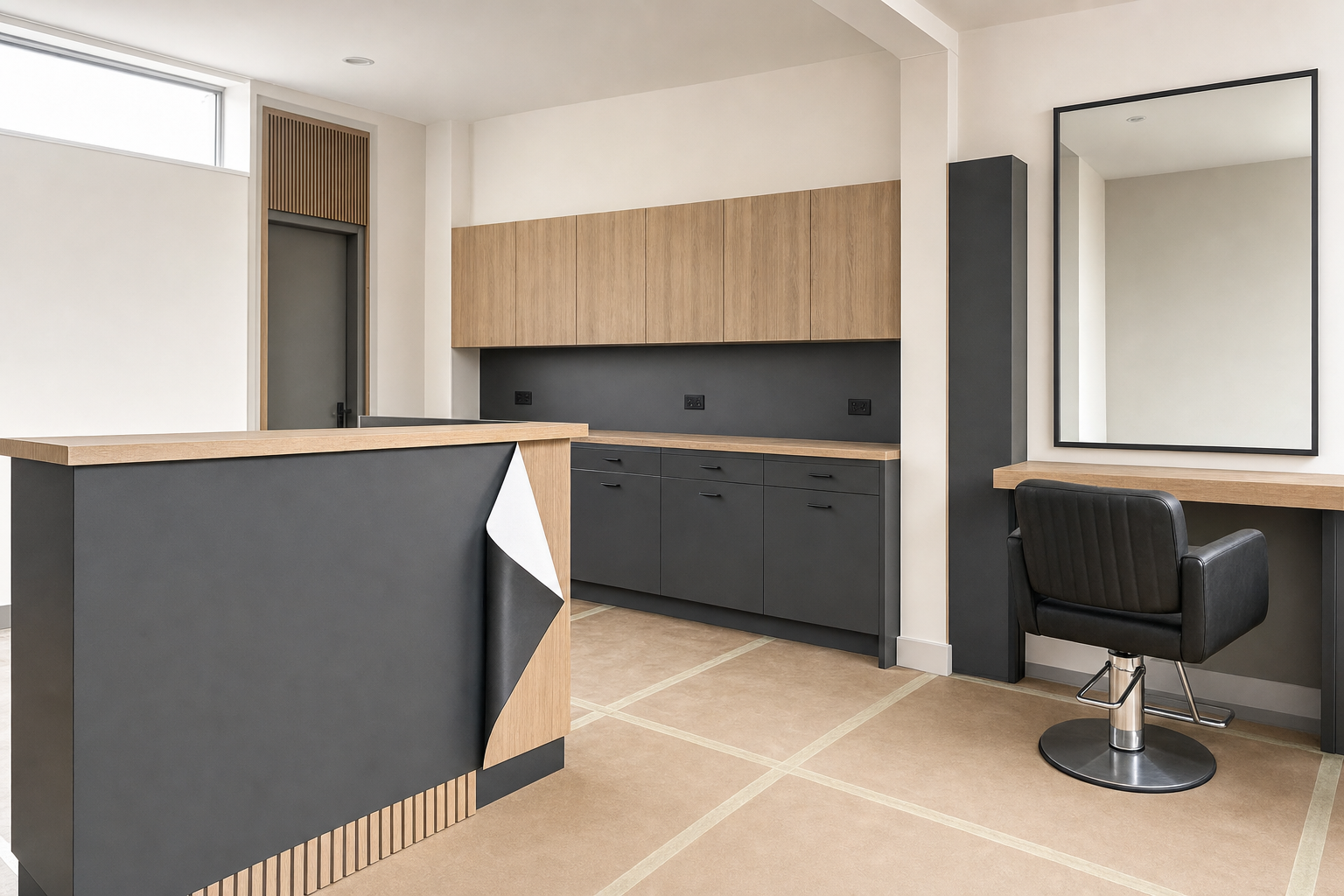Modern barbershop interior with a stylish black chair, large mirror, and wooden cabinetry.