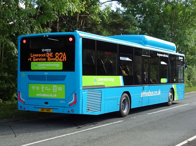 The new 17 plate MAN Eco City Gas buses based at Runcorn Arriva depot have entered into service on 82A between Runcorn and liverpool. Ilustrating both sides, front and rear angles of the bus type is No: 5011 reg: OW17 WNC seen on the busway next to the entrance to the Arriva Garage.
