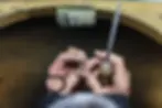 Jeweller's hands holding a ring