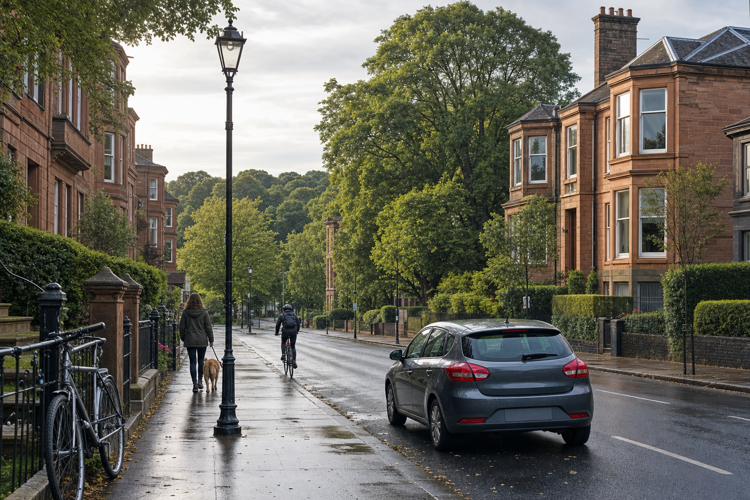A peaceful street lined with red-brick buildings, where a person walks a dog and a cyclist rides past, under a cloudy sky.