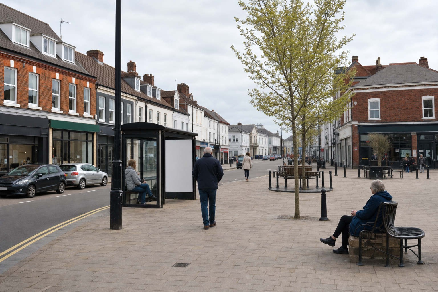 A quiet street scene with a bus stop, benches, and trees, featuring pedestrians and parked cars.