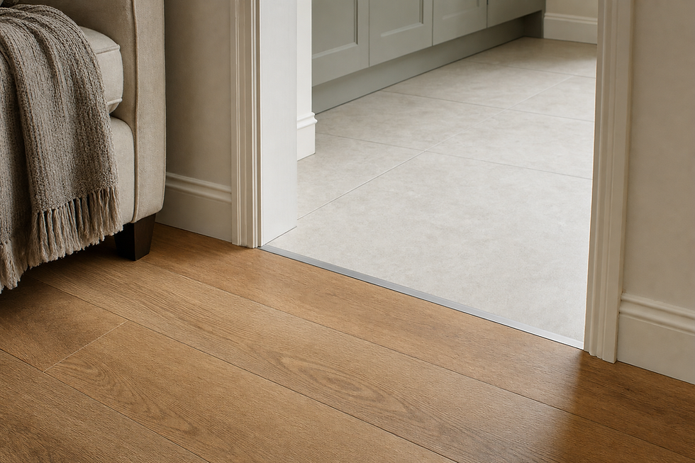 A modern interior shows the transition from wooden flooring to tiled flooring with a visible threshold strip.