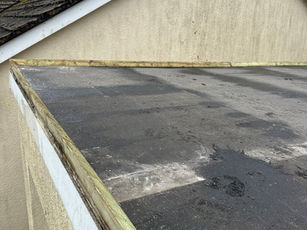 Garage roof repair in progress