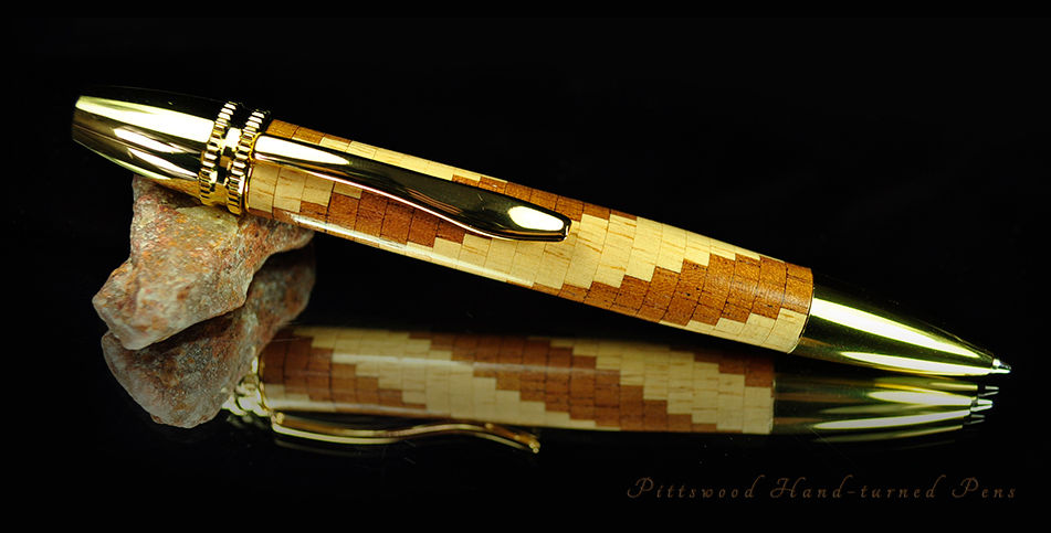 Hand-turned segmented twist wood ballpoint pen by Pittswood Pens in South Wales UK