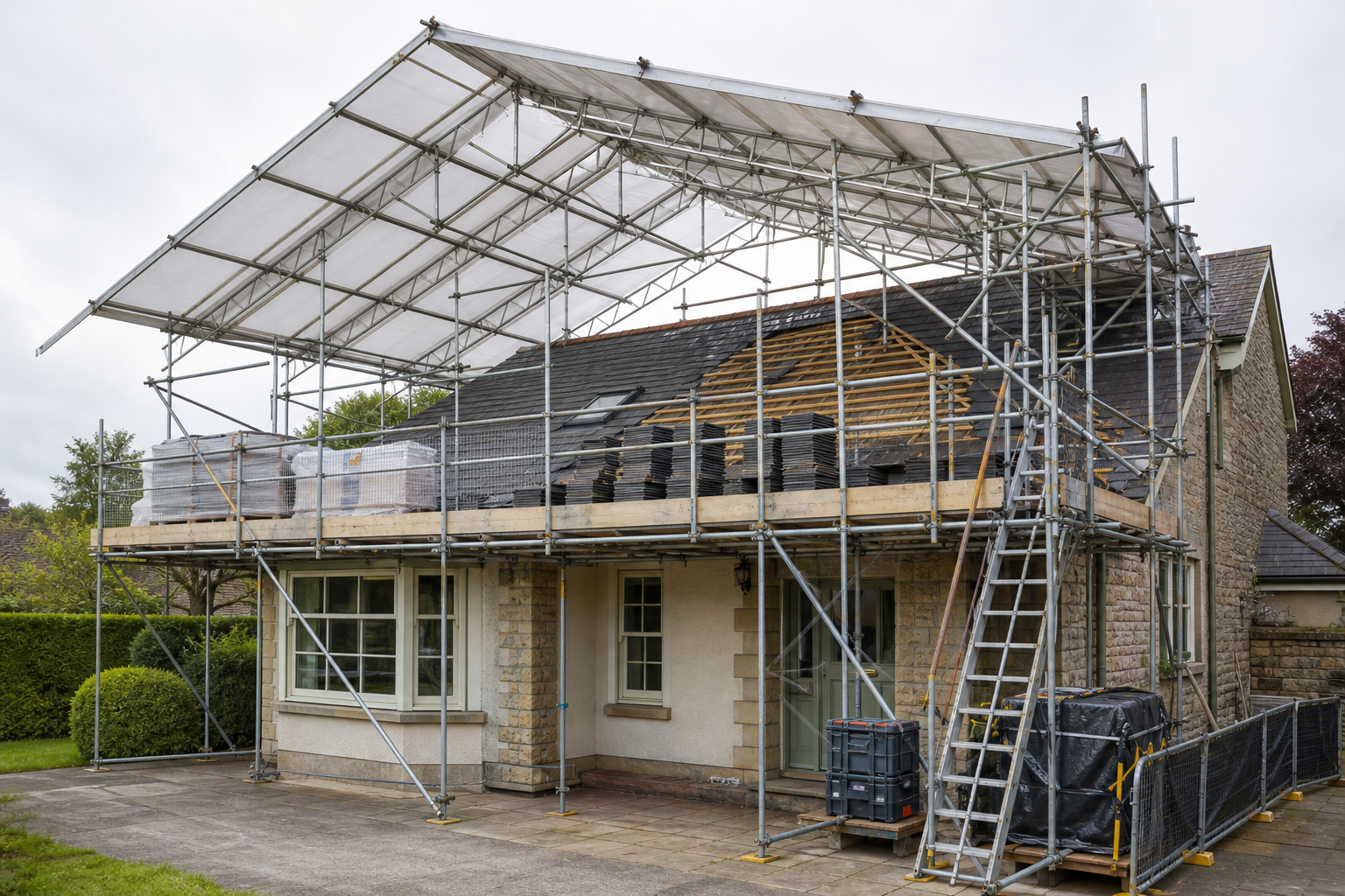 House under renovation with scaffolding and roof tiles partially removed.