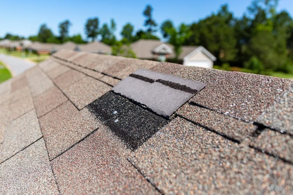 repairing missing shingle on roof in houston company near me