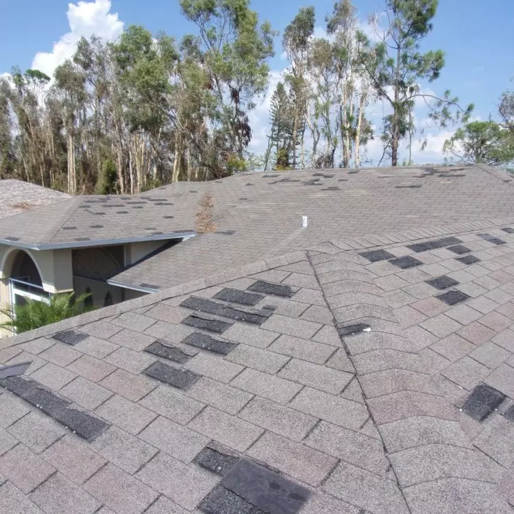 shingles torn off roof from Houston tornado in Cypress and Katy