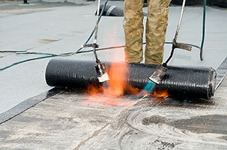 flat roof replacement company in houston
