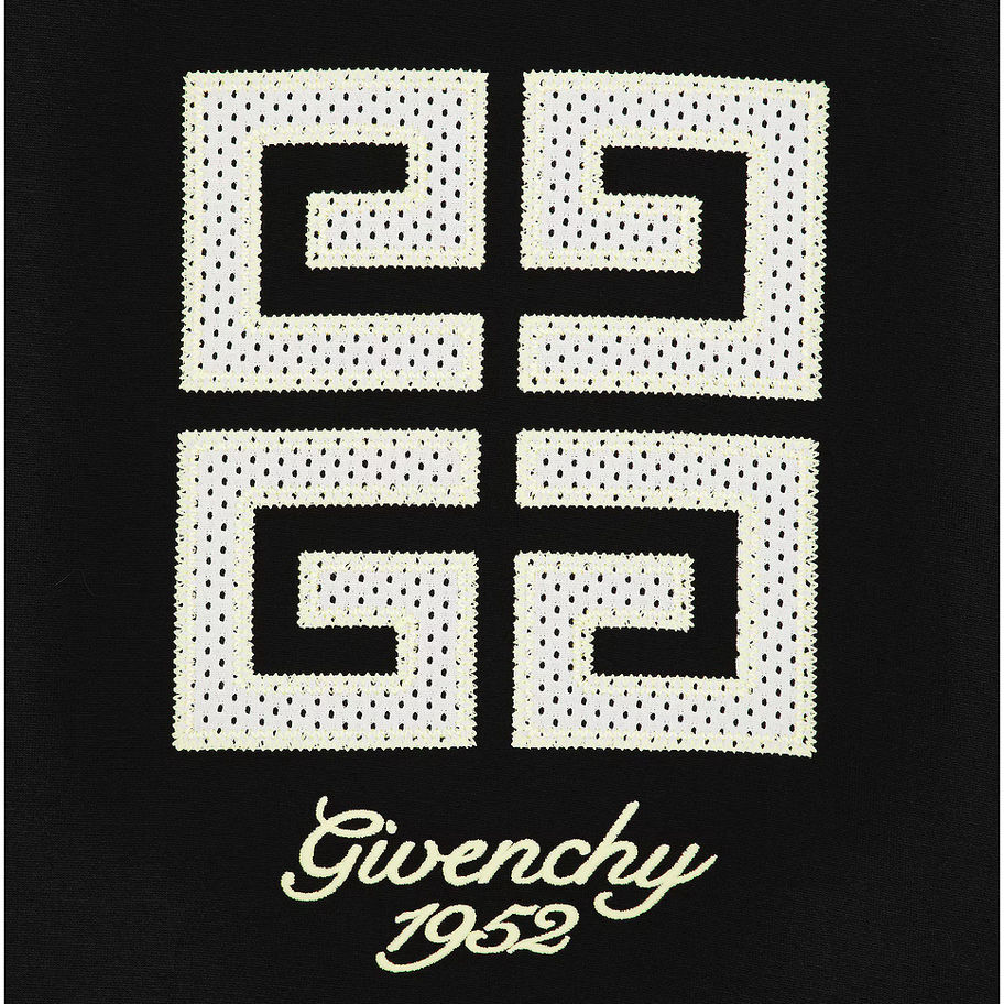 Close-up of four G logo and cursive Givenchy 1952 chest embroidery on black cotton T-shirt