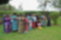 women dressed up in Rubongi yard.jpg