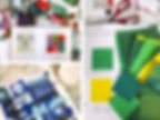 Artistic workspace with color swatches in sketchbooks, colorful paper squares, and red scissors. Text notes detail color schemes.