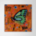 abstract butterfly painting in green and orange framed in oak