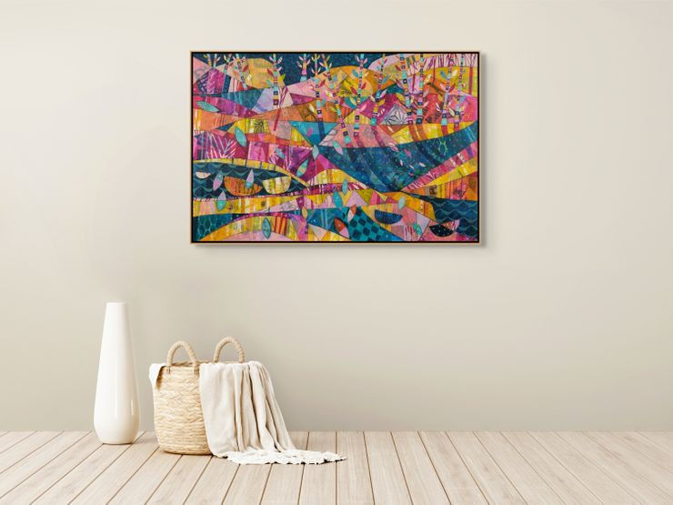 Abstract painting with vivid colors and geometric patterns on wall. White vase and basket with blanket on wooden floor, neutral background.