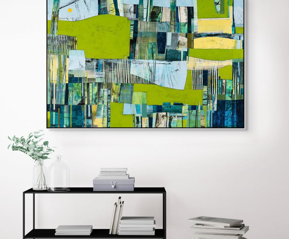 abstract landscape artwork coastal inpired theme in green and blues framed in room scene
