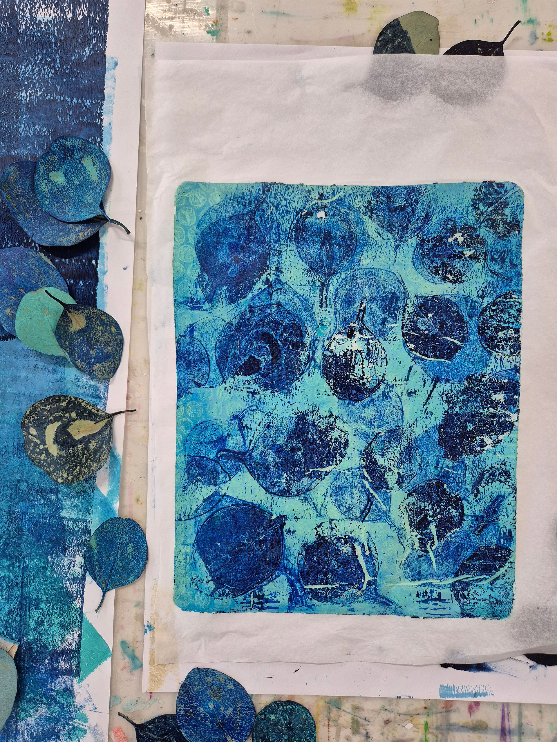 blue and turquoise printed paper with leaves