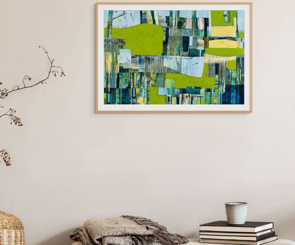 abstract landscape artwork coastal inpired theme in green and blues framed in room scene