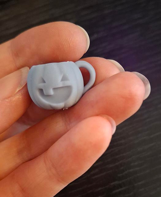 A tiny Pumpkin mug ready to sand and prime for a little creature to snuggle up with.