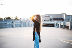Woman Standing in an Empty Court
