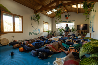 Group relaxation and integration after a breathwork session, allowing the body to settle and restore balance