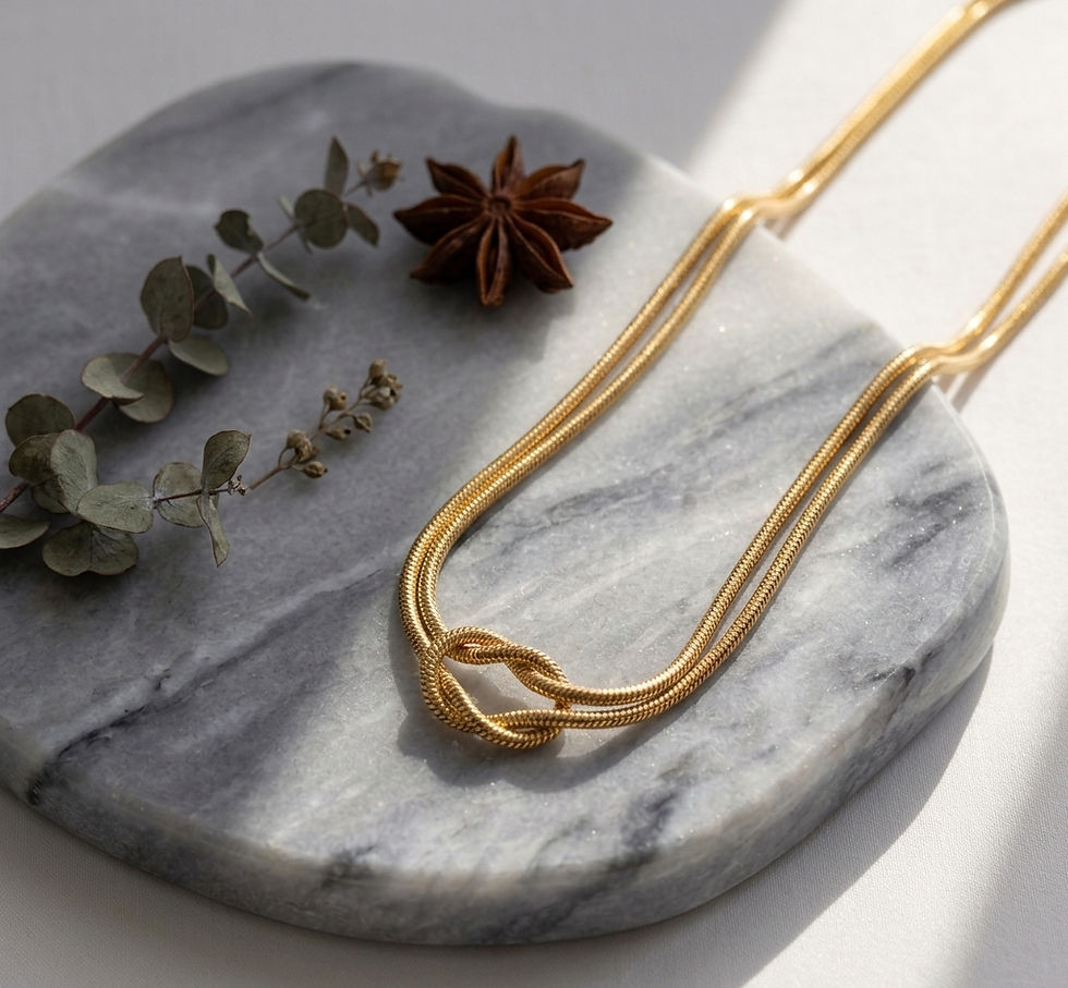Thumbnail: Glowen Knot Pendant Necklace