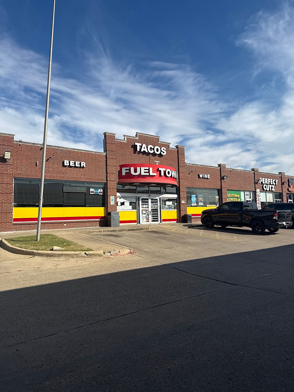 Fuel City Tacos storefront with best tacos in Dallas sign
