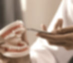 The dentist and patient will discuss oral health, including dentures and implants The dent