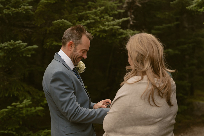 ring exchange on a mountain top for mount Osceola elopement day