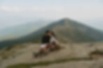 franconia ridge proposal couple on mountain top in nh in white mountains on mount lafayette proposing with dog