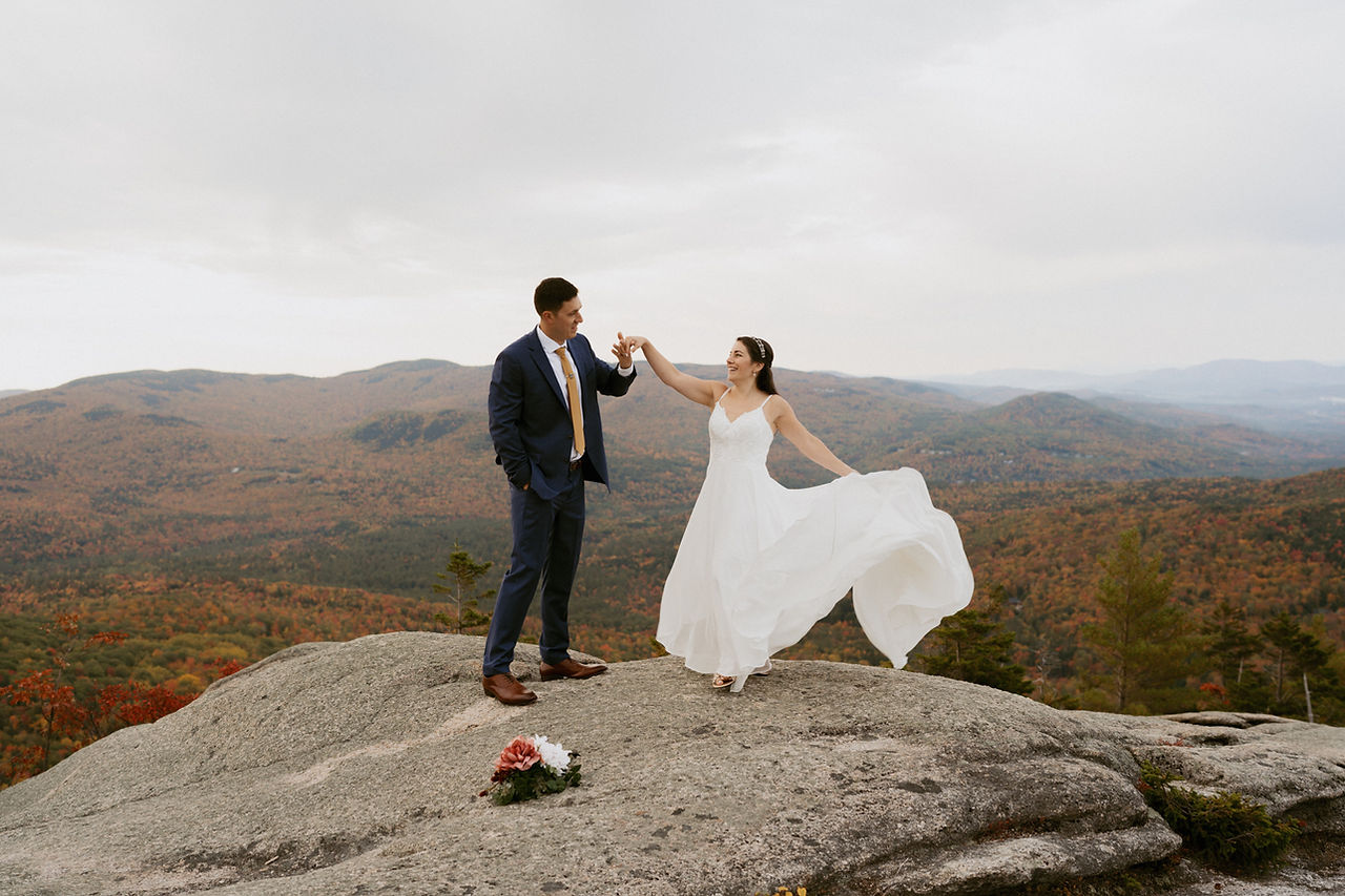 Franconia Notch Fall Elopement couple on mountain top in white mountains