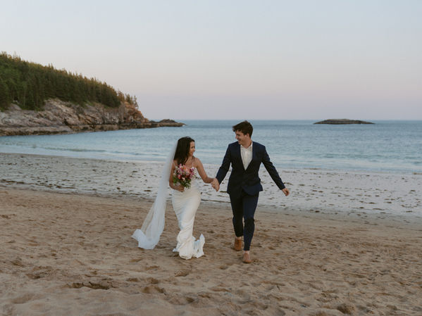 Acadia sand beach elopement day full of adventure, couple canoe, have ceremony, and luxury picnic to celebrate.