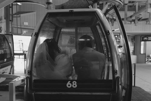 Couple riding in gondola for loon mountain elopement