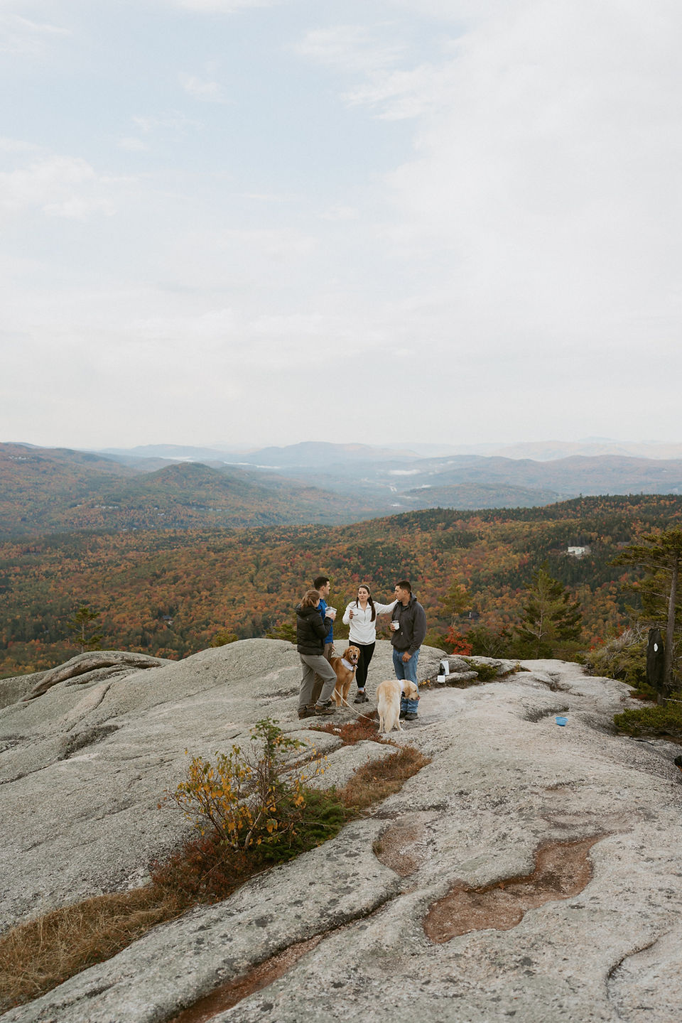 Franconia Notch Fall Elopement couple on mountain top in white mountains