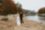 Kancamagus Highway Elopement Couple at mountain overlook in the fall on wedding day
