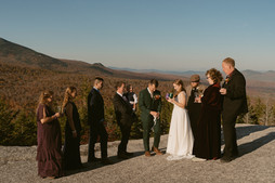 White Mountains Micro Wedding with family on a mountain top at sunrise in the fall