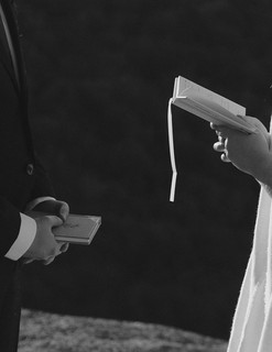 couple during ceremony for waterville valley elopement at sunrise