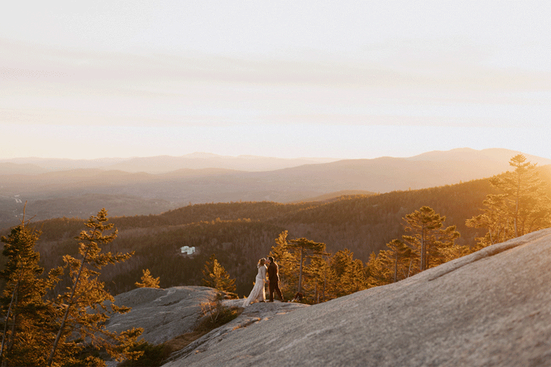 gif of couple on mountain top at sunset in white mountains for white mountains elopement.