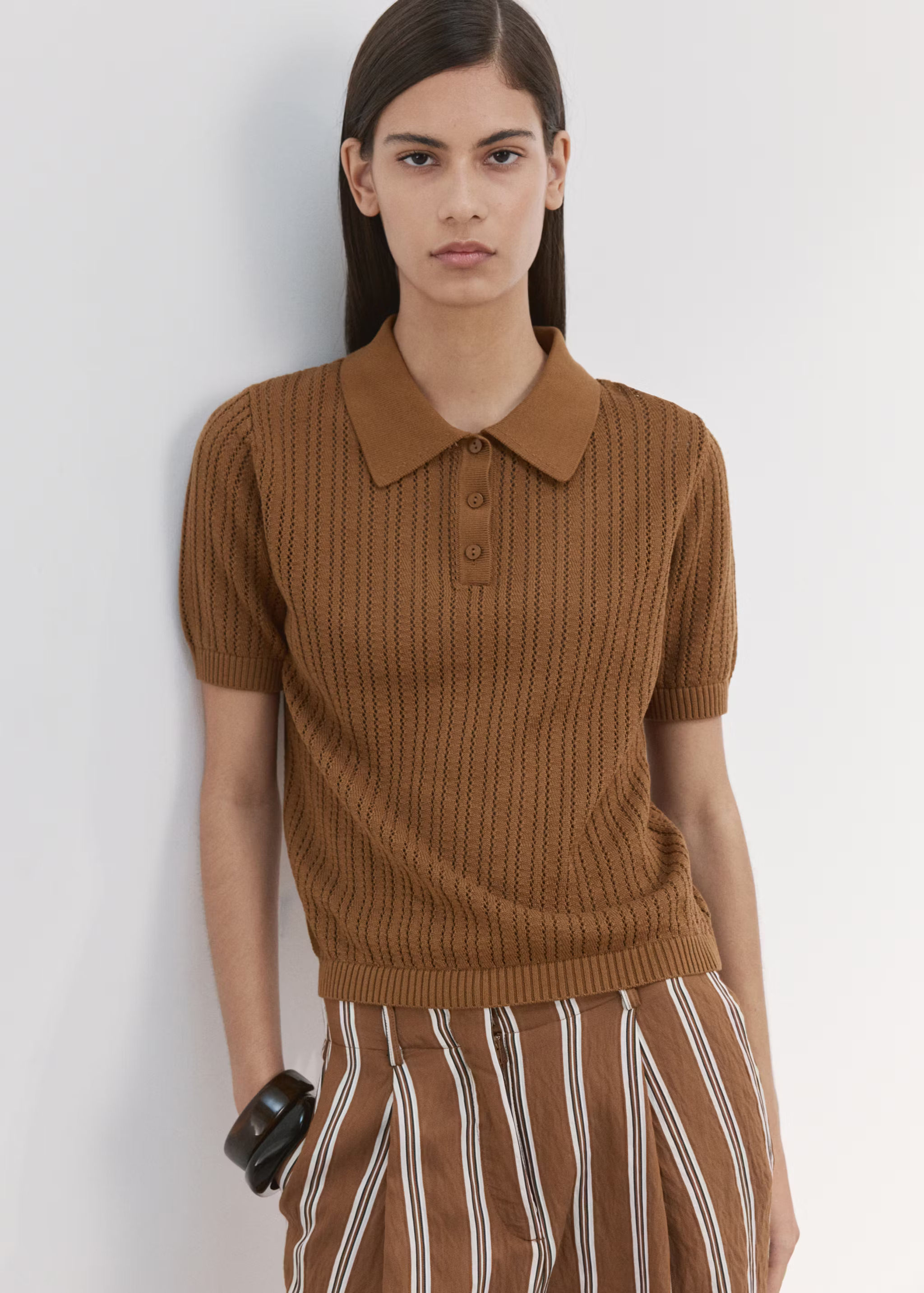 Openwork knitted polo-neck sweater