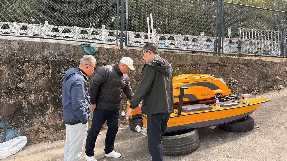 Ricky Ng and Washington Zhou at the autonomous smart vessel prototyping grounds with Rex Chan from Xiao Tun Intelligence